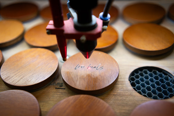 Custom Engraving on Thistle Farms Candle Lid