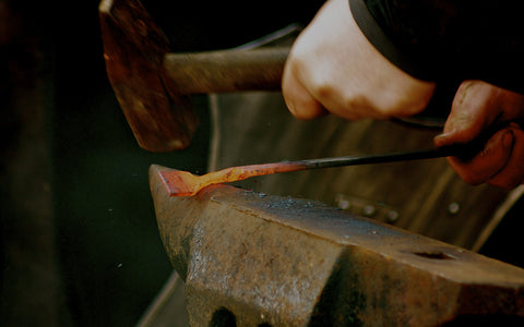 Artisans working on authentic iron forged hardware for borderland rustic hardware | Where tradition, healthy living, and creative projects come together. Best In Class. Blacksmith, Smithing, Forging, Forge, Blacksmithing, Iron, Steel, How to Forge, Process, How To, farmhouse stable cabin artisan antique homestead accents mexican country old world home decor restoration trunk chest dresser shutter table garage box wrought herrajes puertas rústico mueble garaje cerrojo pasador steel portones woodworking carpentry cabinet fence vintage accessories