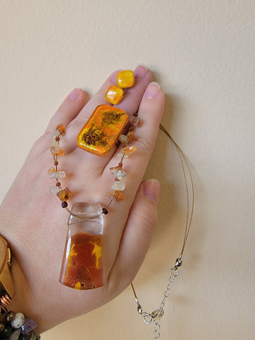 Orange glass bead jewelry repair