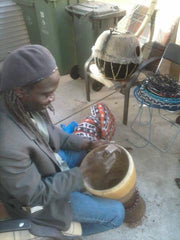 West African drum carving