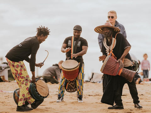 West African drummers for mental health at beach