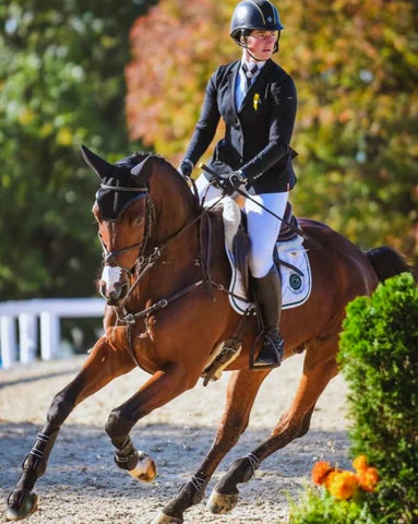 Alexa Ehlers riding her brown horse