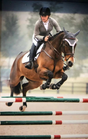 Samantha McCleery jumping her horse