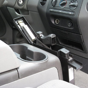 portable gun safe in car front of center console vehicle installation