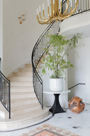 Grand Entry Way with curved staircase