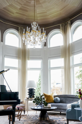 Tall, round room with a grand piano