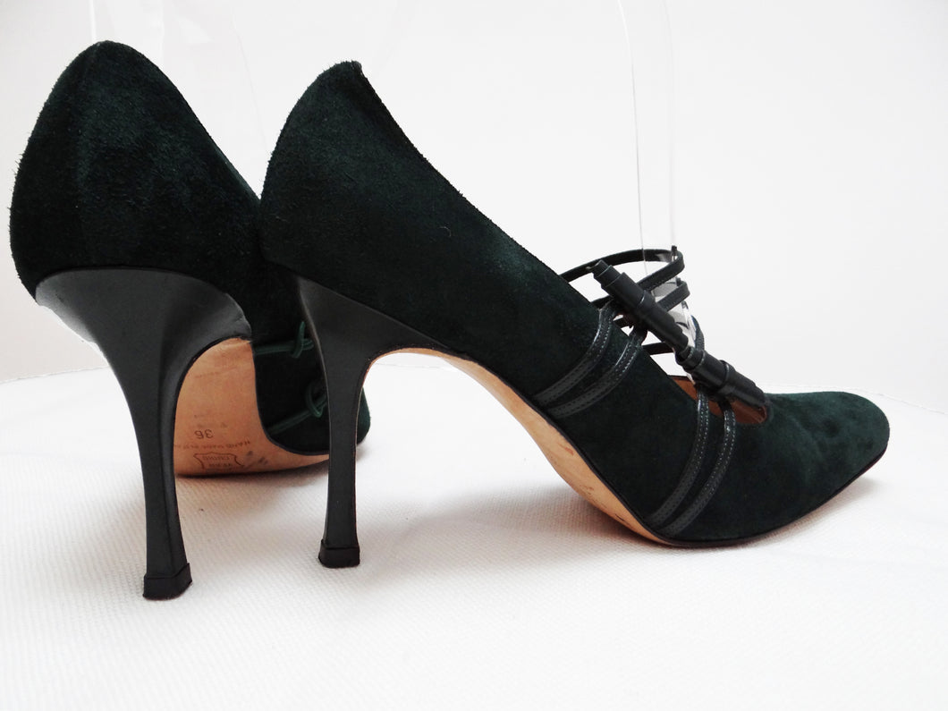 green suede court shoes