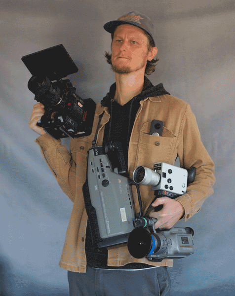 Calvin-Millar-Portrait-With-Cameras