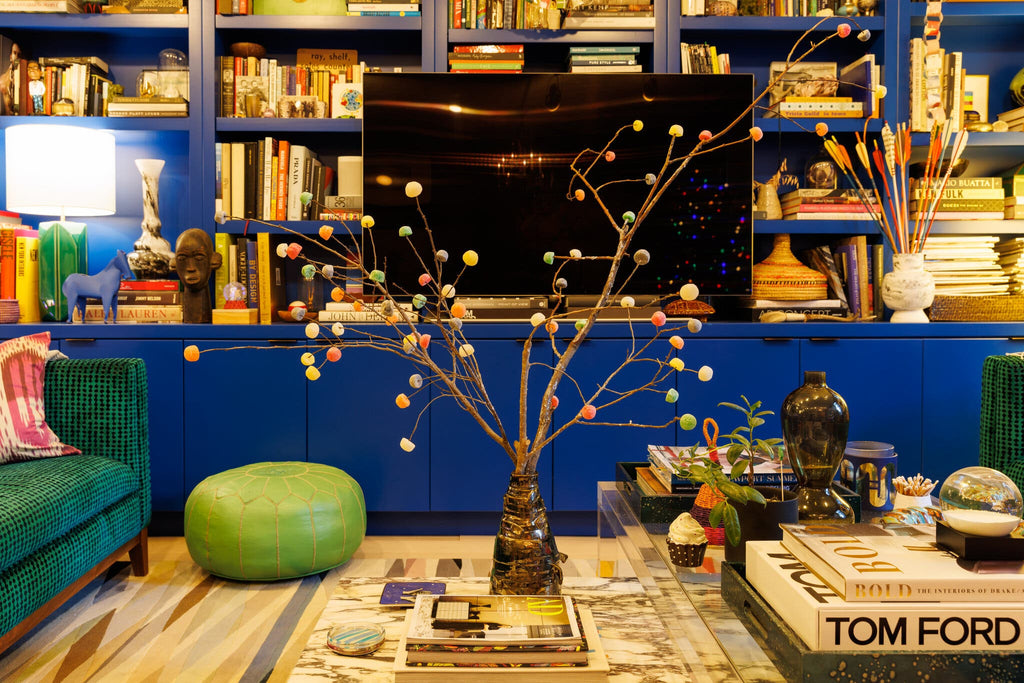 blue library with natural holiday decorations