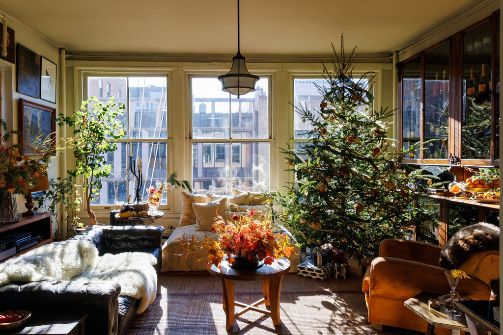 bright living room with natural holiday decorations