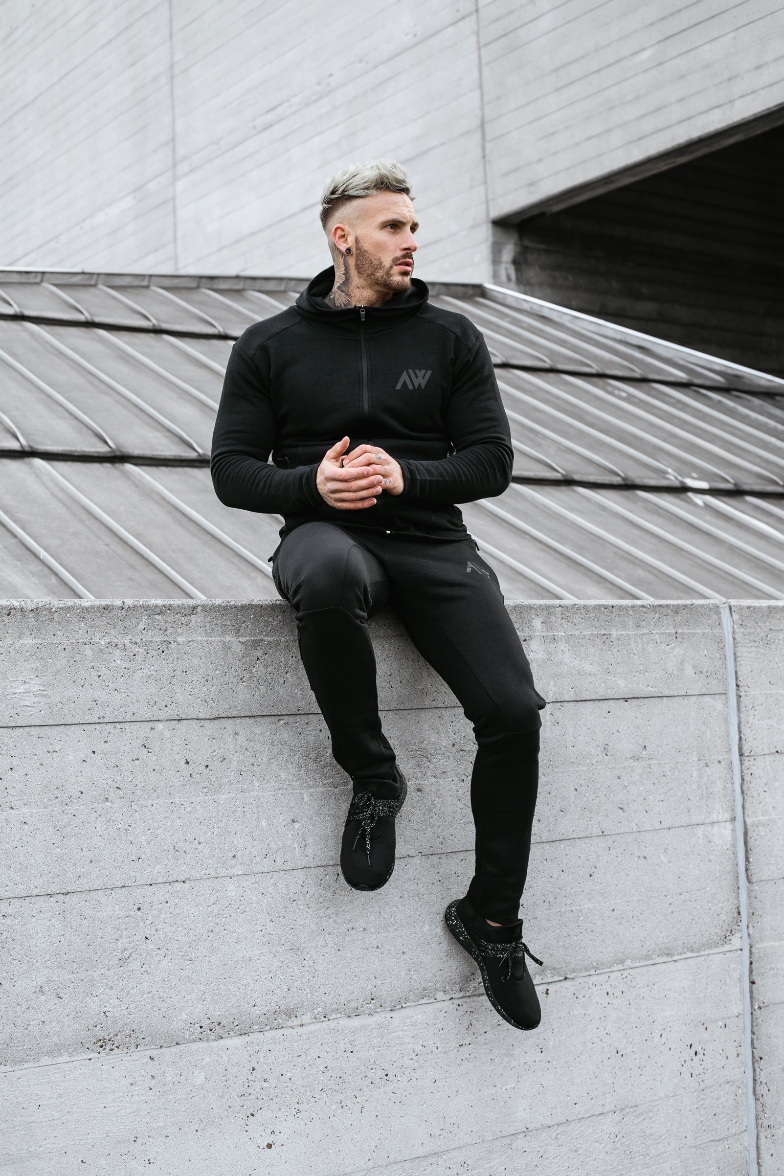 black tech tracksuit