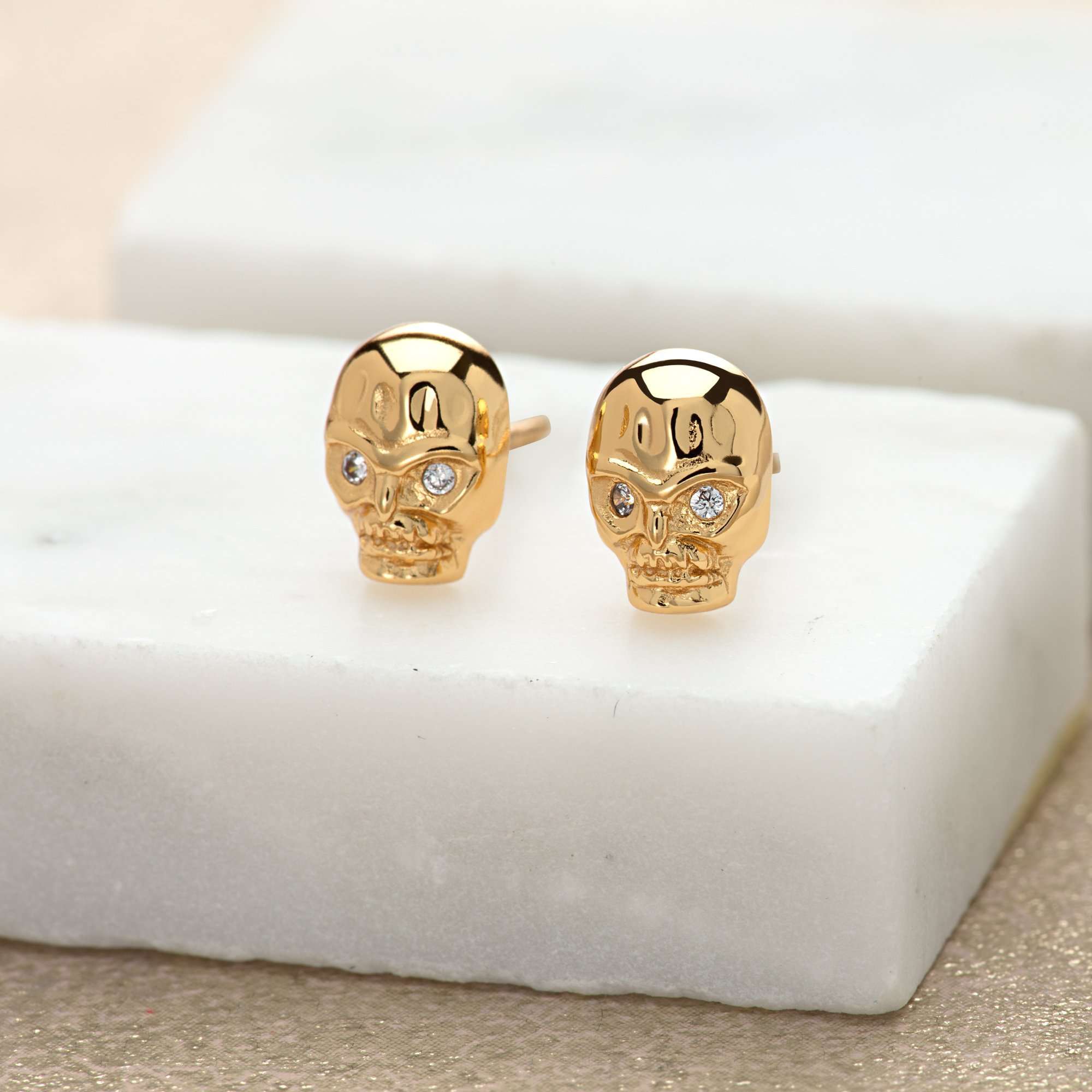 Skull with Sparkling Eyes Stud Earrings