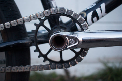 BMX bike small sprocket and chain, up close.