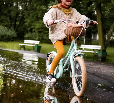 cycling through puddle smile