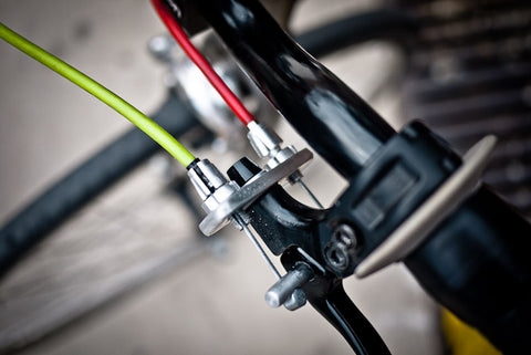 Close-up view of a bike brake mechanism.