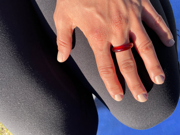 woman wearing whitestone jewelry co. root chakra red carnelian ring