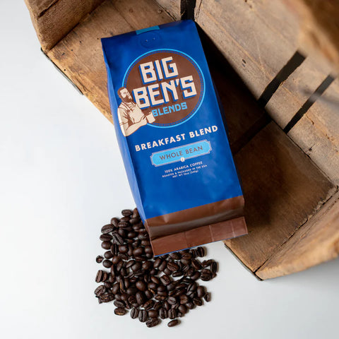 A bag of Big Ben's Blends Coffee Whole Beans Coffee lying on a Cutting Board