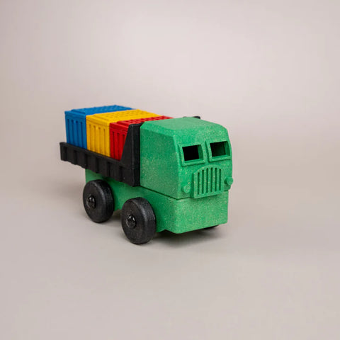 Colorful toy truck for kids made from recyclable materials at Laurel Mercantile Co