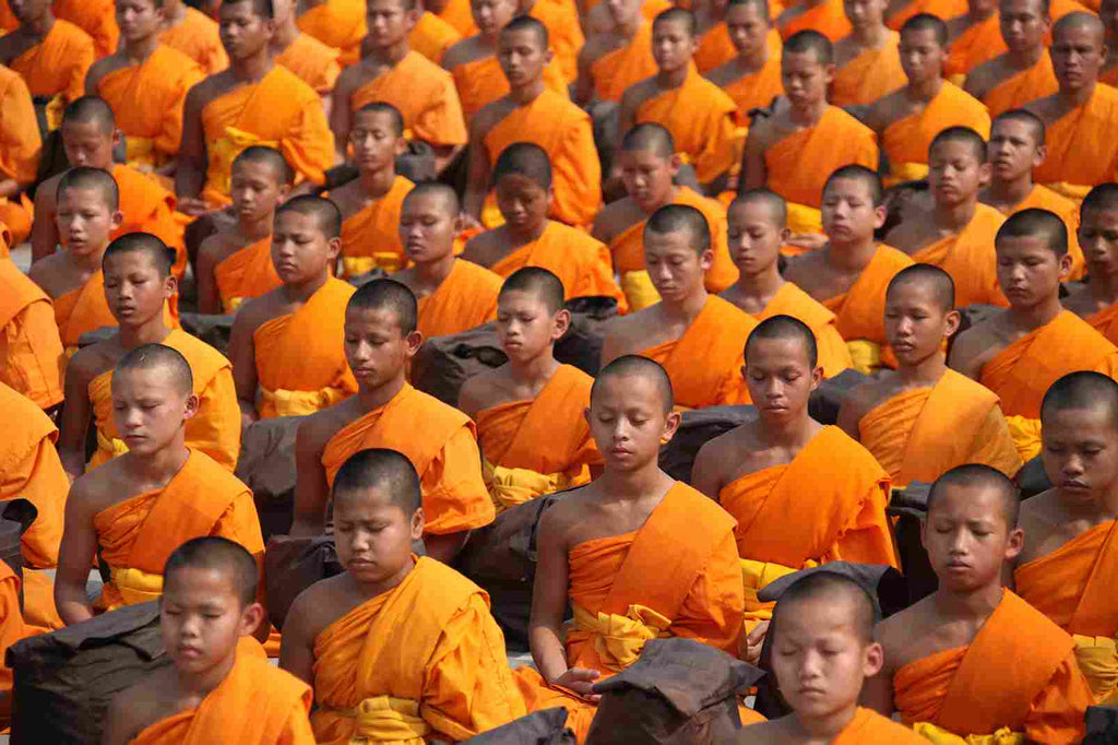 buddhists working with a powerful mantra to archieve their goals