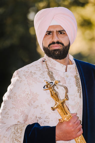 HK Groom Dev in a Light Pink Floral Jacquard Sherwani