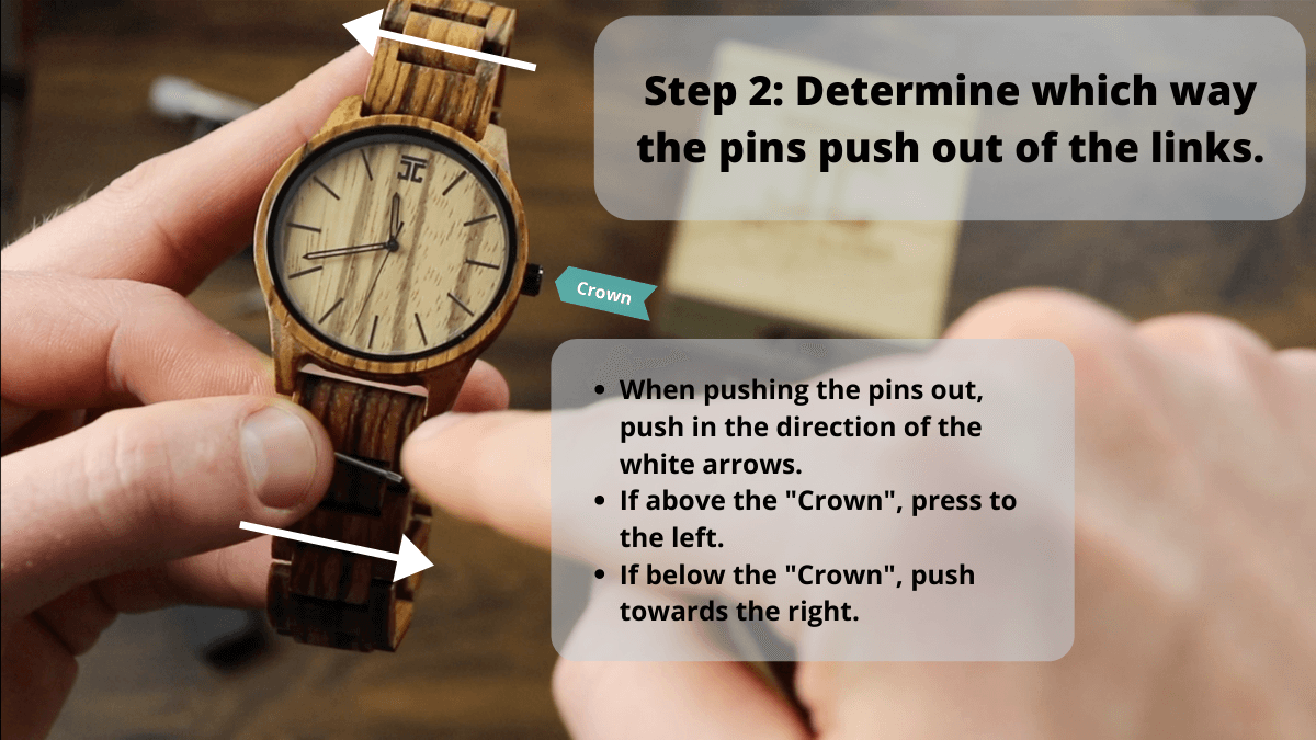 Diagram showing which way to push the pins out of the watch