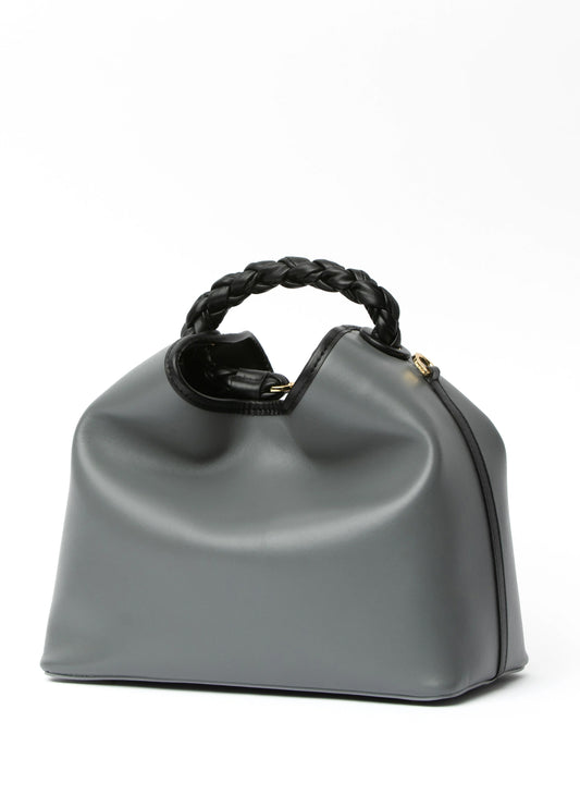 A UNIQUE BLACK LEATHER BAMBOO BAG WITH 18K YELLOW GOLD HANDLE