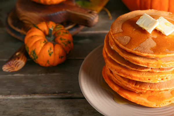 A stack of fluffy pumpkin pancakes