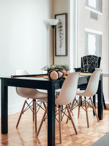 A Dining Table With A High Chair