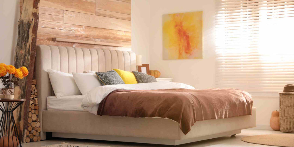 Image depicting a bedroom interior with a balanced blend of light and bold color schemes. This layered design approach uses lighter hues for the walls and floor, and bolder colors for the furnishings and accessories, creating a visually appealing and comfortable sleeping space.