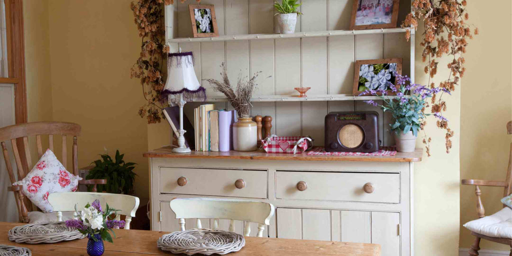 Photo showcasing second-hand cabinets as a budget-friendly material option for an eclectic kitchen renovation. The image underscores the character and charm these reused elements can bring to a kitchen, while also promoting sustainability and cost-saving.