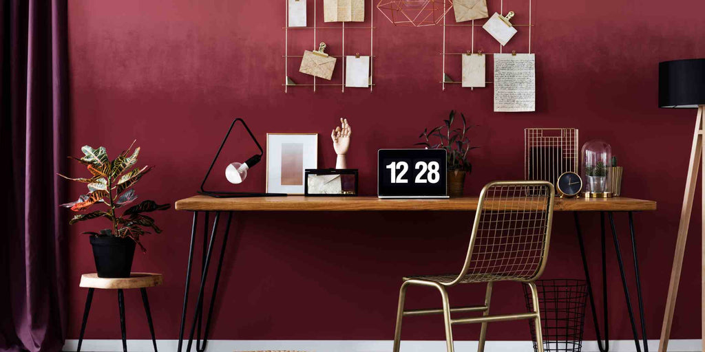 Image presenting color scheme ideas for home renovation, emphasizing the warm and cosy concept with a deep red color scheme for a home office. Showcases a rich and inviting color palette with deep red tones, creating a sense of warmth and comfort. This color scheme adds a touch of sophistication and energizes the home office space, making it an inviting and inspiring environment for work and productivity.