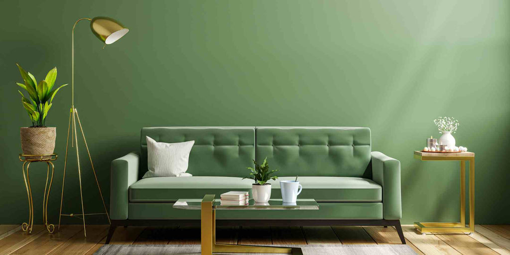 Image displaying a bold design concept for HDB Jumbo renovation featuring colour play; an emerald green corner with a matching sofa stands out, adding a touch of luxury and depth to the space while enhancing the overall aesthetics.