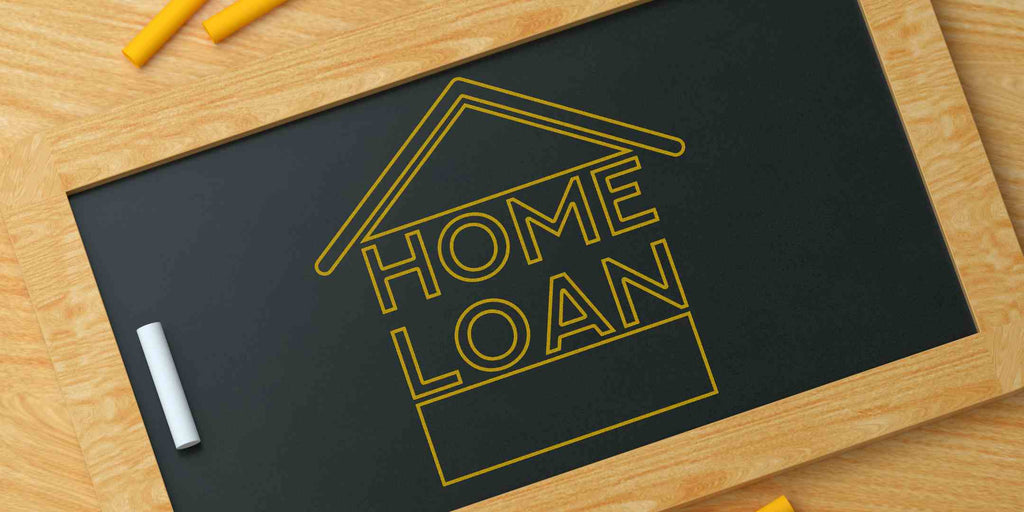 Image of a mini chalkboard with 'Home Loan' text written on it, illustrating the concept of utilising a home loan specifically for renovations. This image highlights the potential flexibility and strategic use of home loan funds to improve and add value to a residential property.