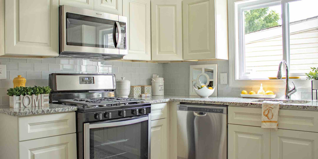 An image depicting a crucial point in a house renovation checklist: the use of energy-saving appliances. The picture features a modern kitchen fitted with various energy-efficient appliances, showcasing a commitment to sustainability and reducing energy consumption while maintaining functionality and style.