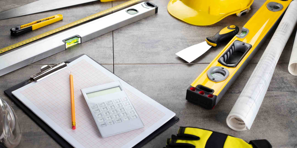 Image showing contractor's renovation tools along with paperwork and a calculator, symbolizing project estimation and planning, with the title 'Securing Your Dream Renovation with a Cheap and Good Renovation Company in Singapore.' This picture emphasizes the thorough preparation and accurate budgeting required for a successful and affordable renovation project.