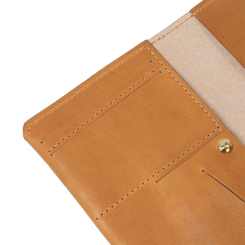 Leather passport holder compatible with AirTag