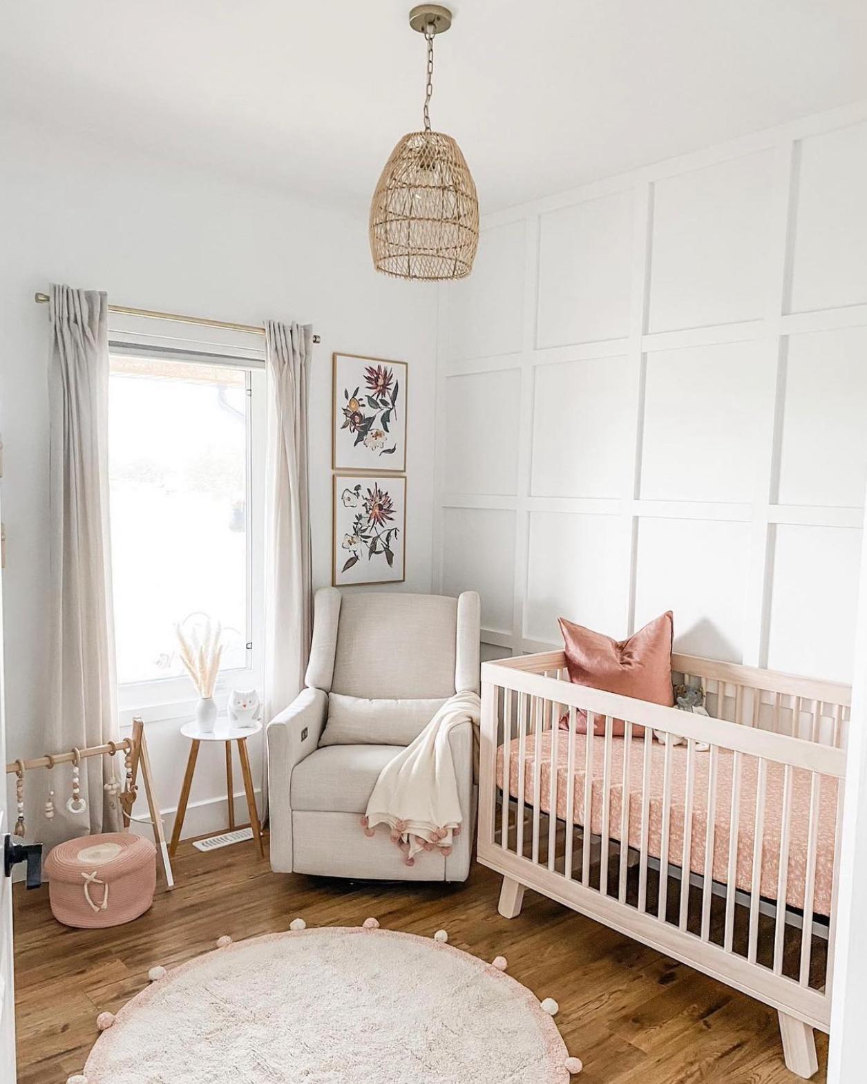 A chandelier provides a beautiful element to this nursery featuring our Juniper Prints artwork. www.juniperprintshop.com