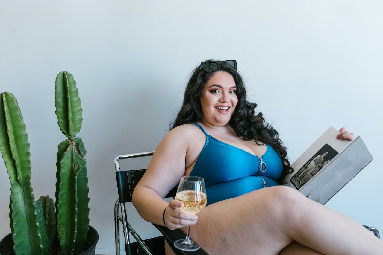 A curvy woman wearing a bathing suit