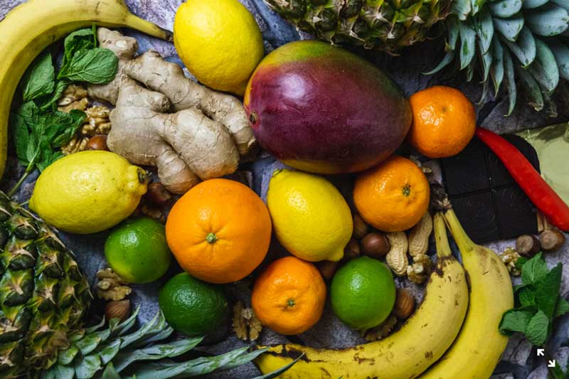 tropical fruits close up placed on falt surface