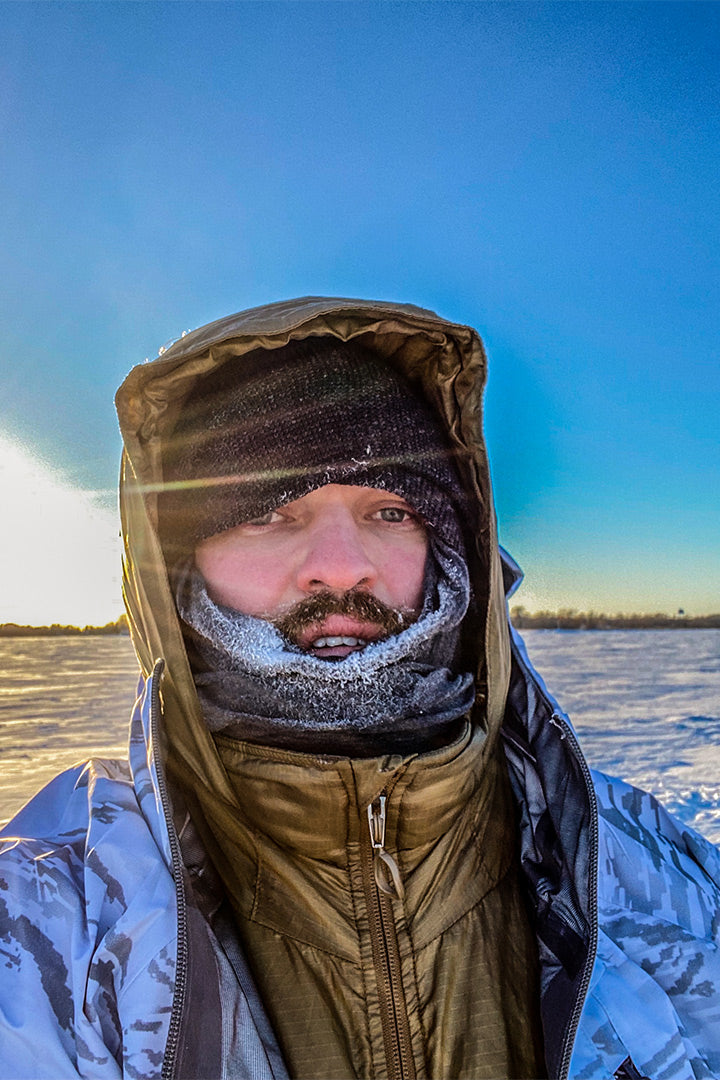 Product tester in a full layering system with the neck tubes frozen while Lake of the Woods in -15F°.