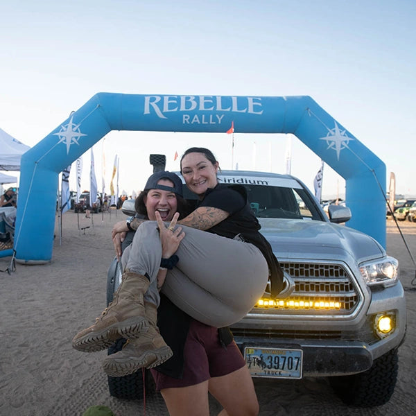 Rebelle Rally Overlanding Finishers celebrating at the finishline.