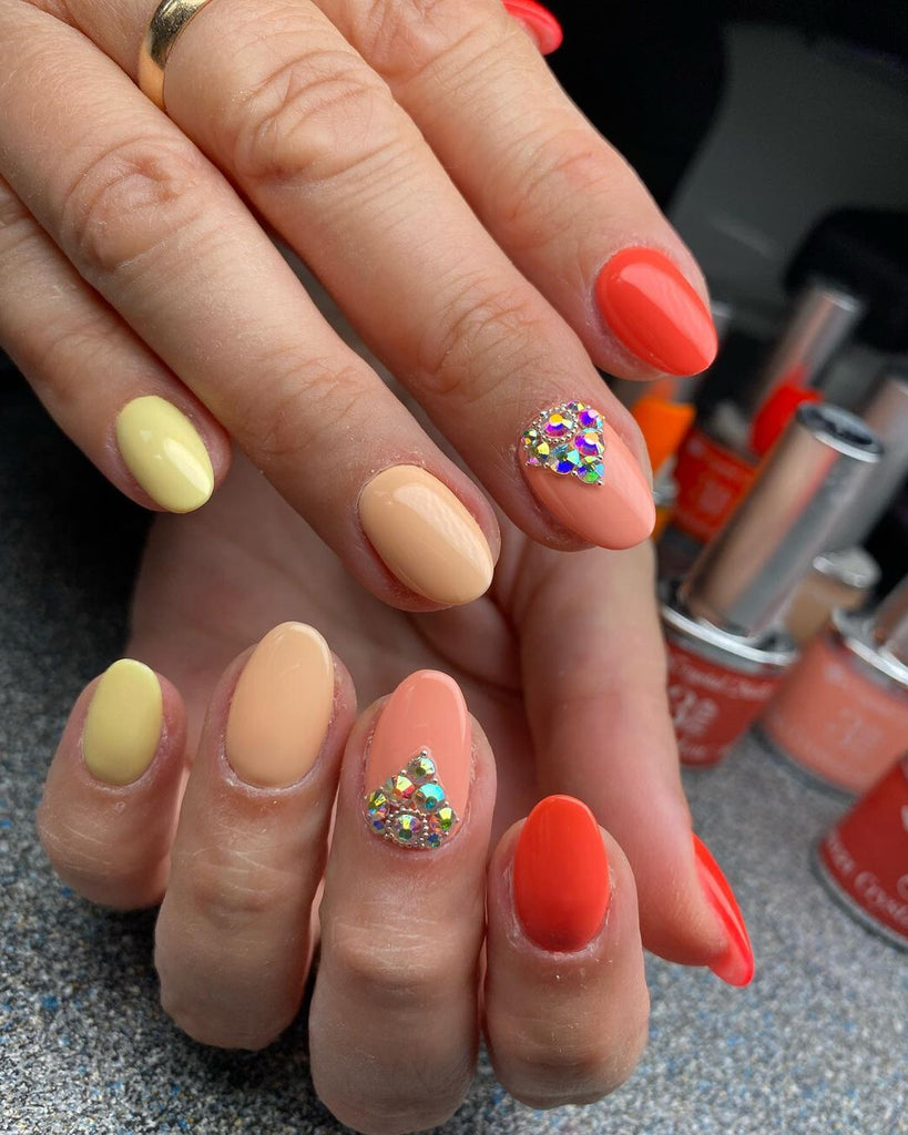 Skittle embellished nail art design