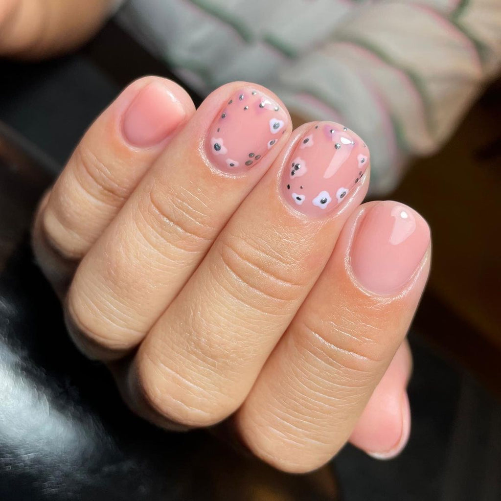 50 Best Holiday Nail Art Ideas & Designs : Sparkly Mauve Pink Nails with  Snowflake