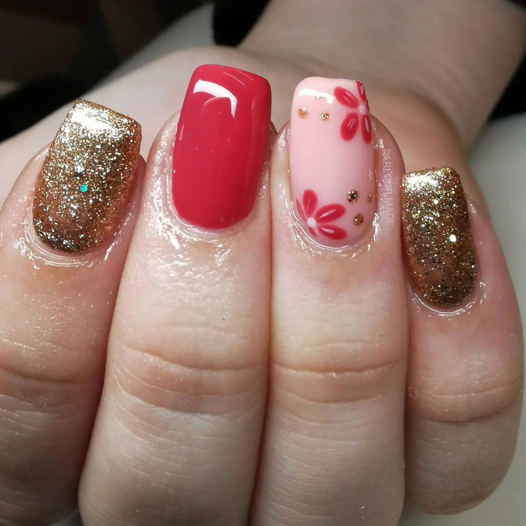 Red glitter floral nail art design