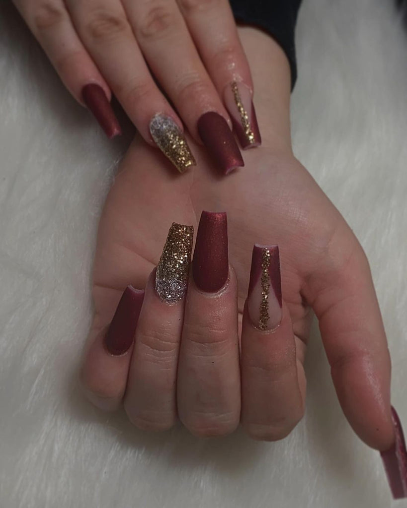 Maroon glitter nail art design for bride