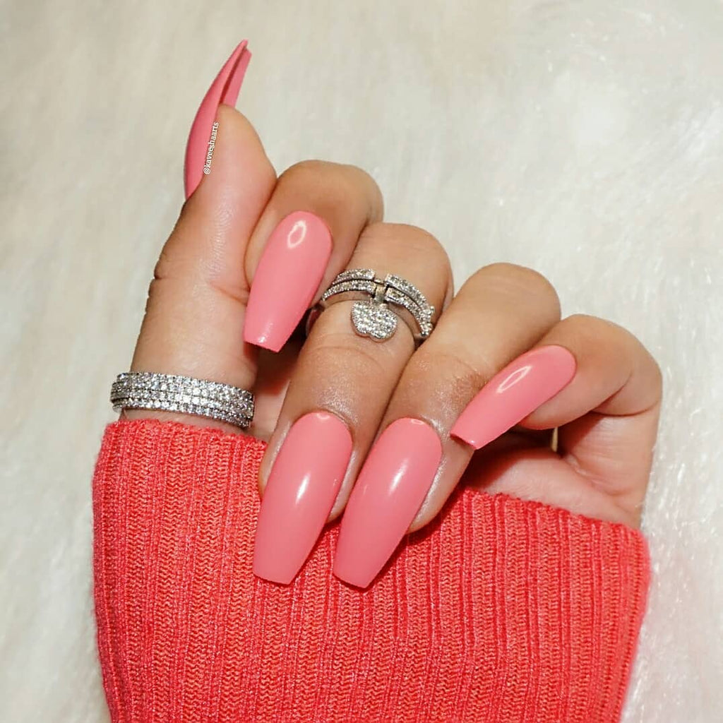 Peach pink nail polish shade 