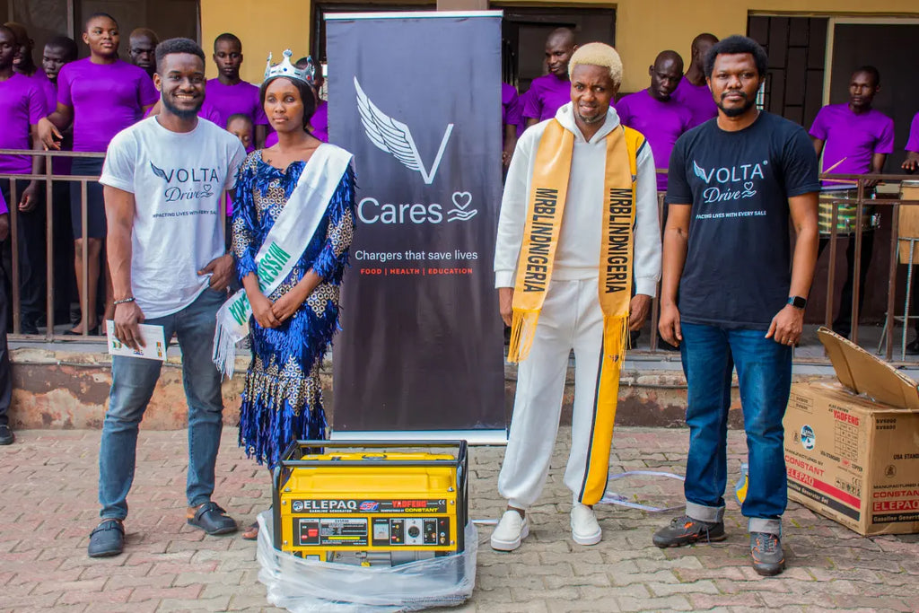 Volta Drive team gifting generator to the students