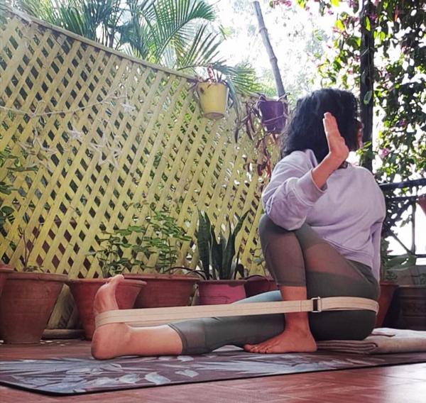 Seated twist on kosha yoga co mat