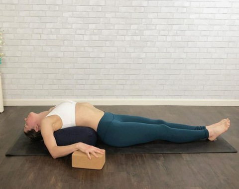 fish pose on kosha yoga co yoga bolster