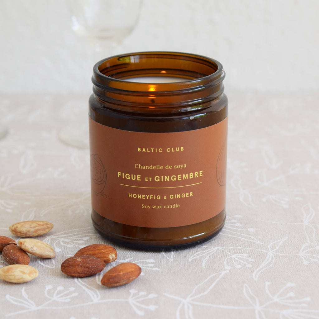 Honeyfig and ginger fragranced soy candle in amber jar by Baltic Club